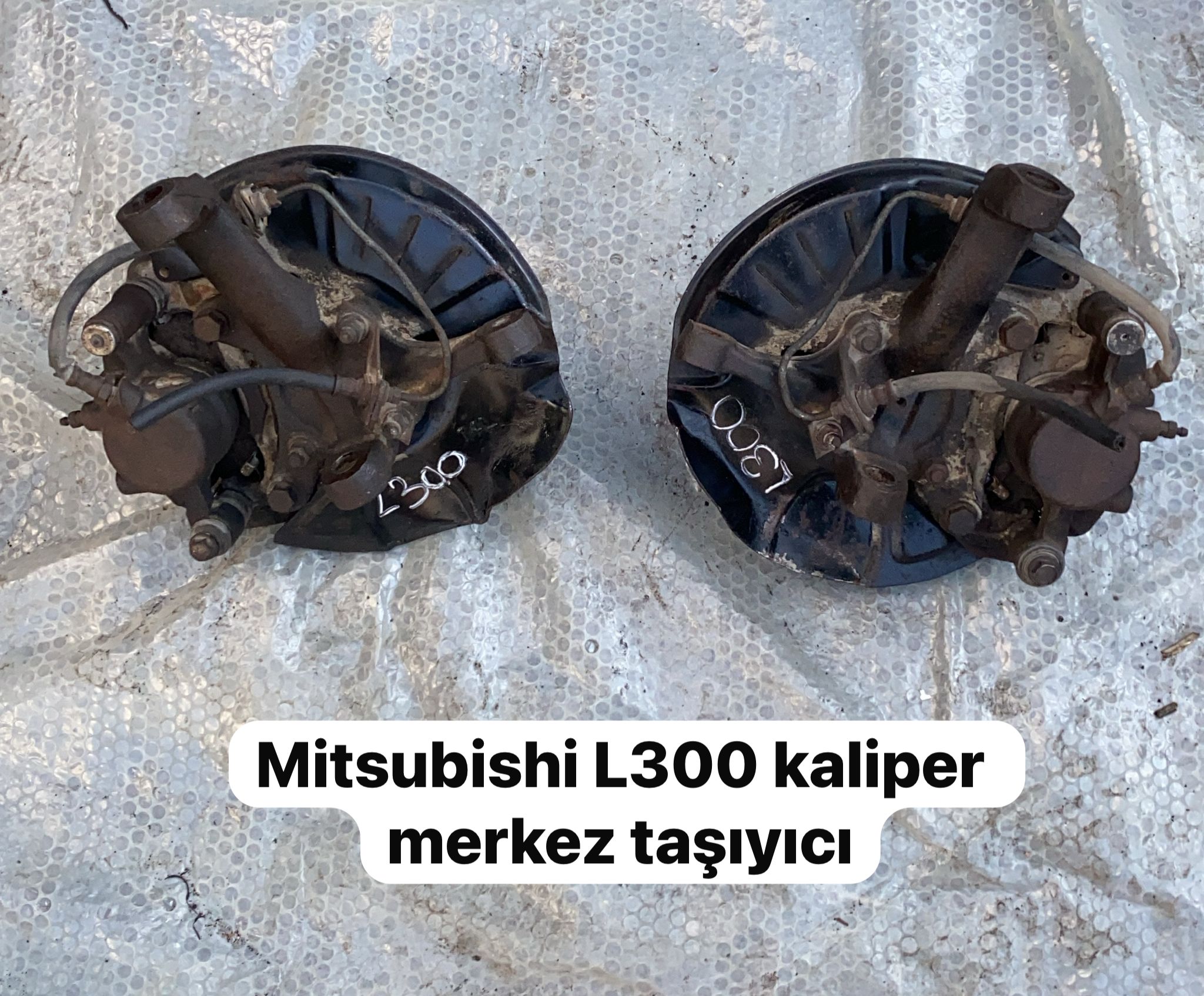 MİTSUBİSHİ L300 KALİPER MERKEZ TAŞIYICI -X14042025-2657